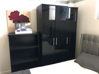 black wardrobe and drawers